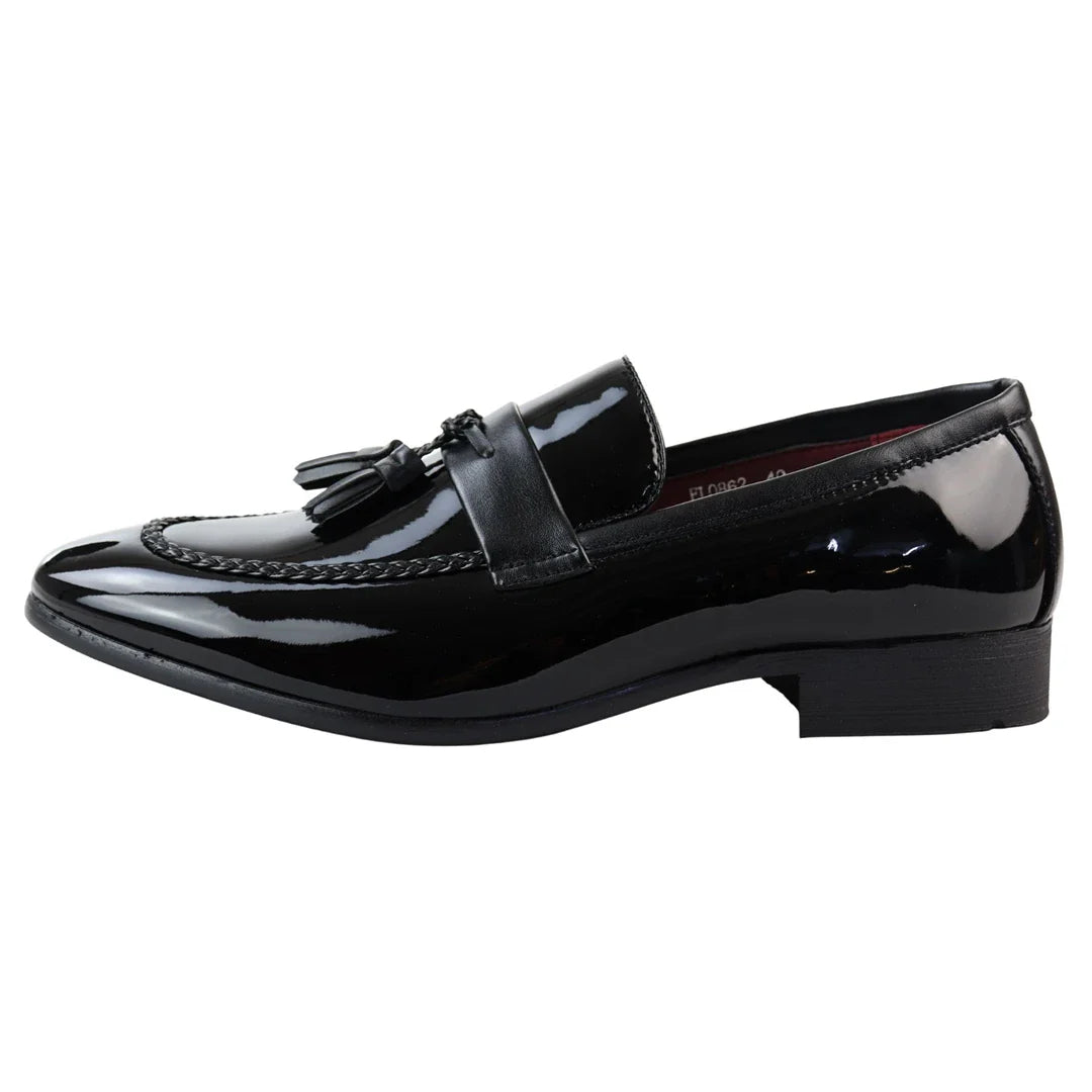 Svarta loafers med tofsmönster för män