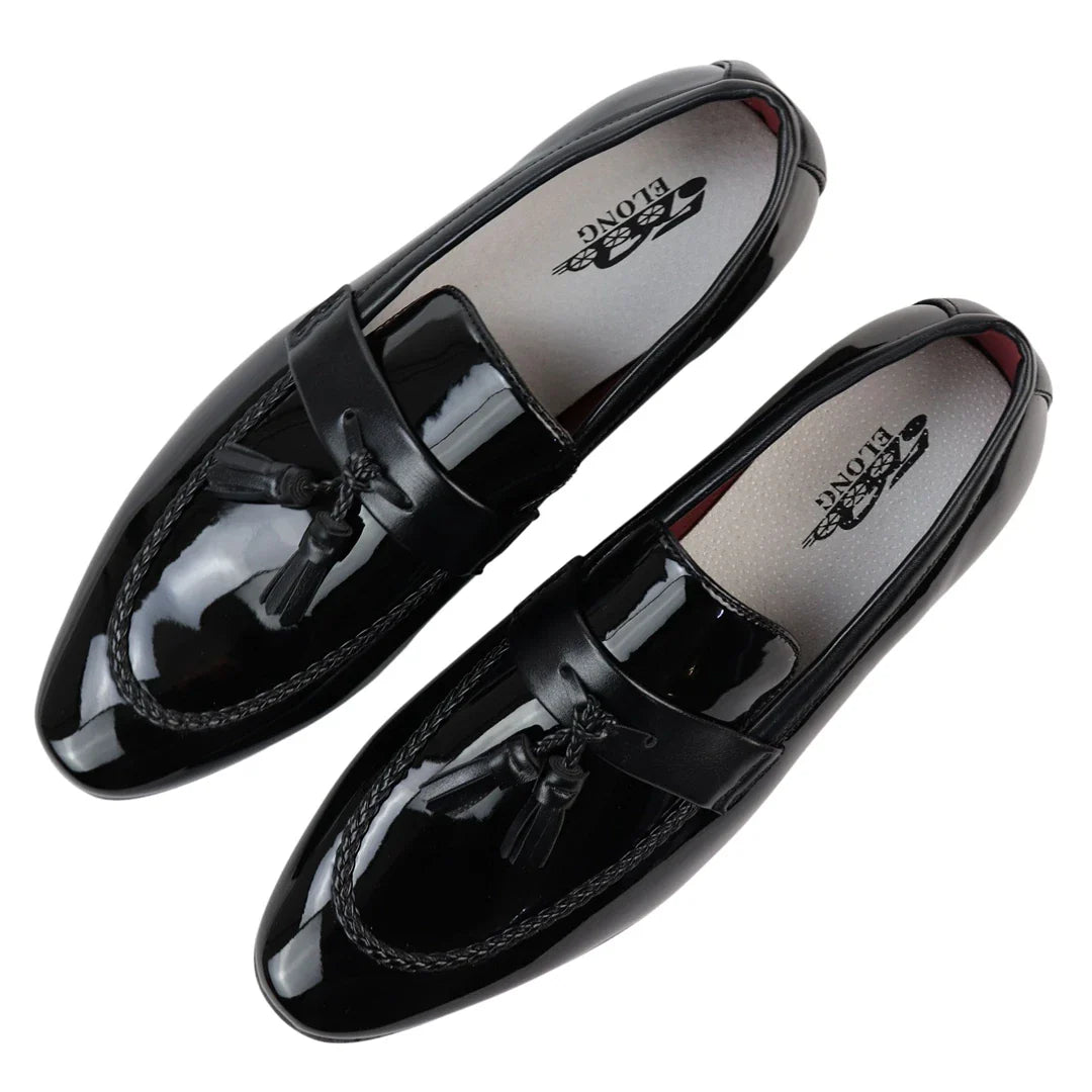Svarta loafers med tofsmönster för män