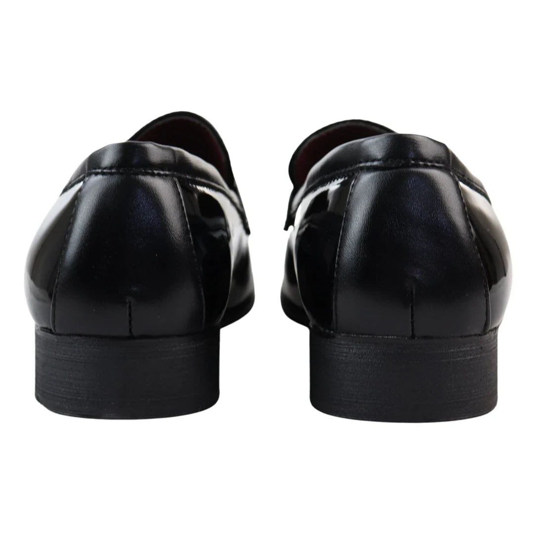 Svarta loafers med tofsmönster för män
