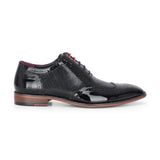 Flynn - Herrskor i svart lackläder med brogue-detaljer