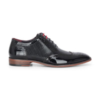 Flynn - Herrskor i svart lackläder med brogue-detaljer