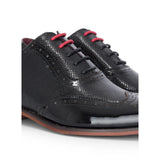 Flynn - Herrskor i svart lackläder med brogue-detaljer