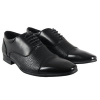 Herrskor med snörning och brogue-detaljer