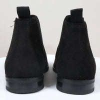 Svarta slip-on-stövlar med foder i mocka och läder för män