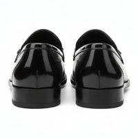 Svarta slip-on loafers i PU-lack för män