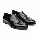 Herrloafers i konstläder med penny-motiv
