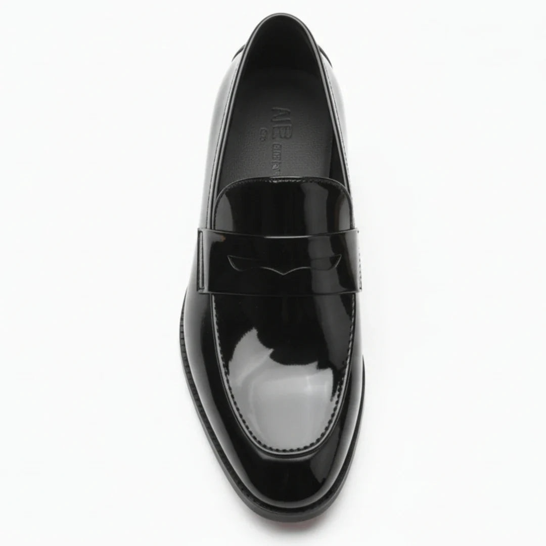 Herrloafers i konstläder med penny-motiv