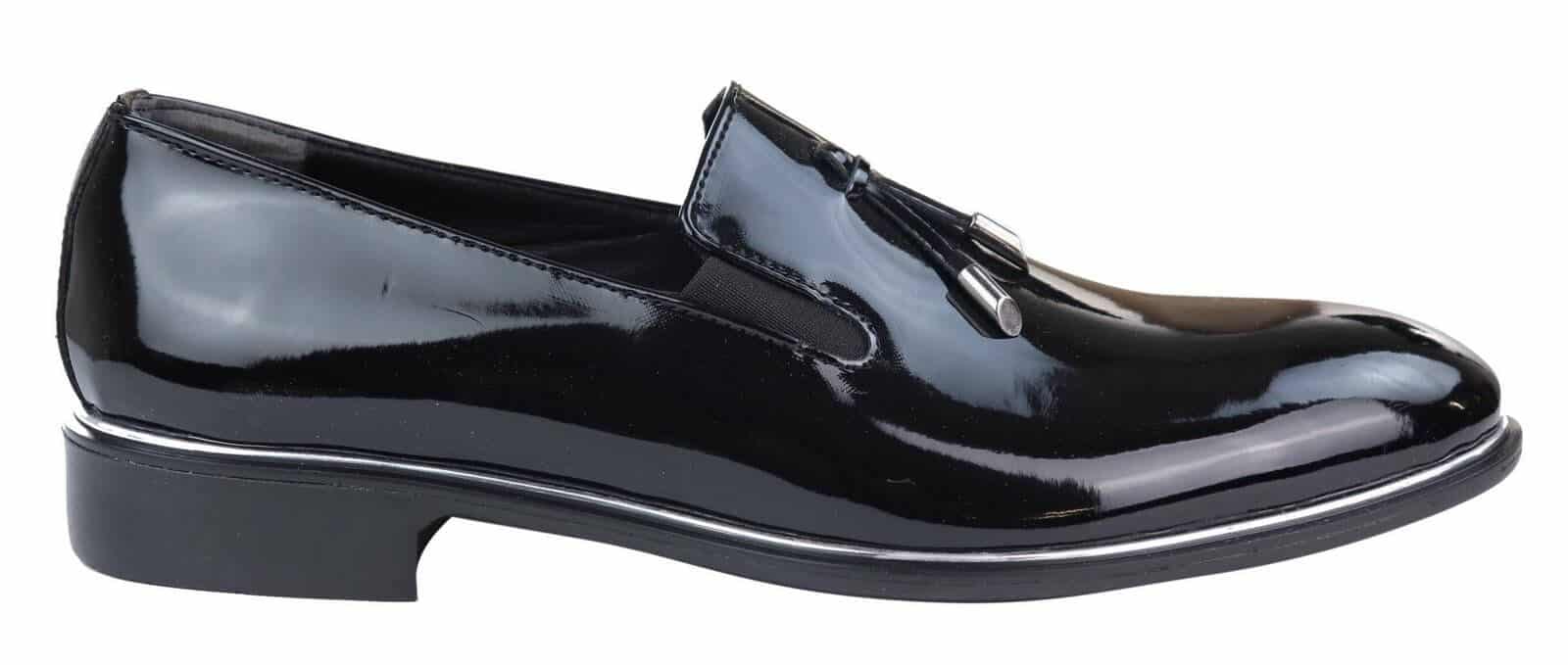 Herrslip-on tofsskor med metalldetaljer