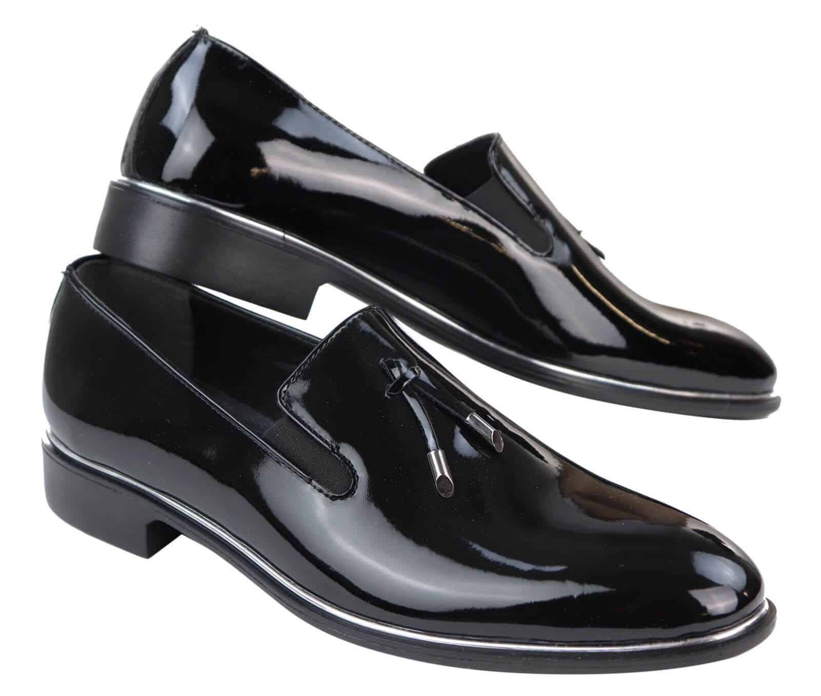 Herrslip-on tofsskor med metalldetaljer