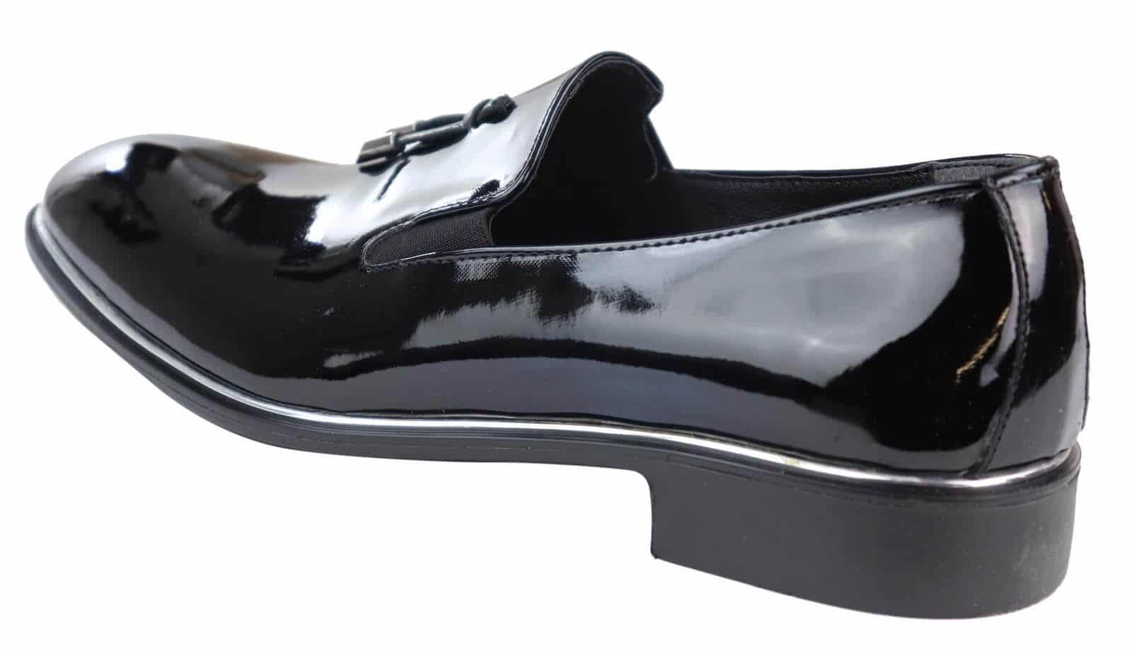 Herrslip-on tofsskor med metalldetaljer